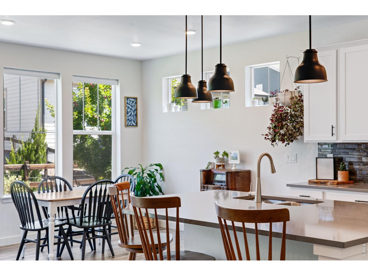 Property Photo 4 eat-in kitchen full of natural light and more than enough space for the whole fam