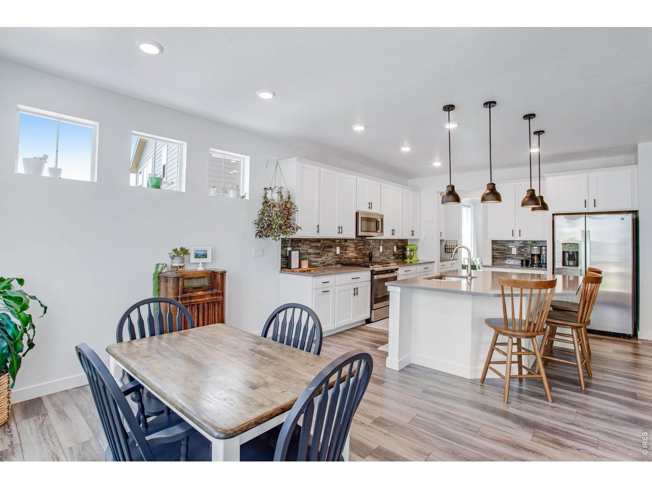 Property Photo 11 luxury vinyl plank flooring in immaculate condition. This home lives new!