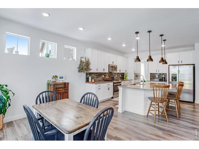 Property Photo 11 luxury vinyl plank flooring in immaculate condition. This home lives new!
