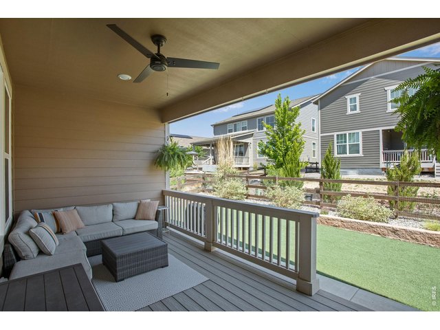 Property Photo 35 relax on this oversized, covered back patio with upgraded can lighting and fan