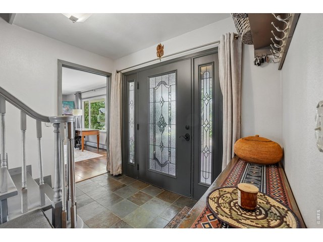 Property Photo 31 Welcoming front door and drop zone area - main front door