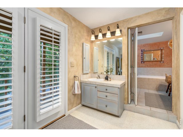 Property Photo 30 Spacious ensuite bath with dual vanities.