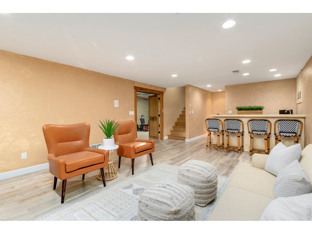 Property Photo 38 Cozy basement family room with fireplace and wet bar.