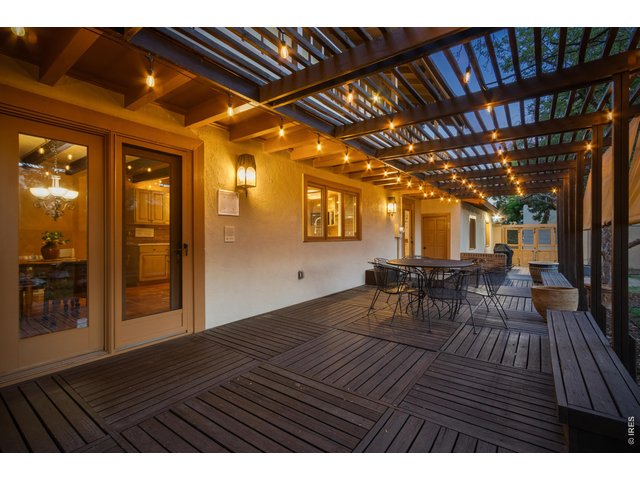 Property Photo 46 Pergola creates an inviting outdoor entertaining space.