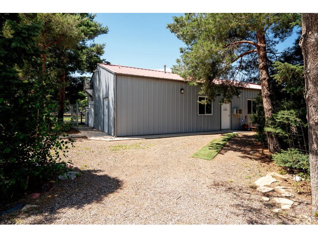 Property Photo 20 Kennel with office, feed room, and 42 kennels