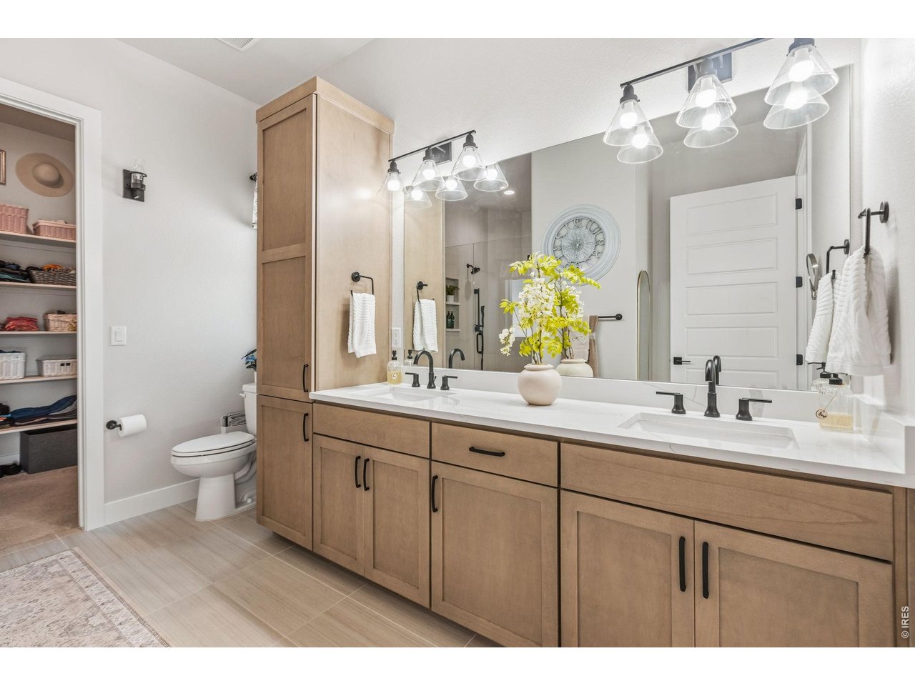 Property Photo 21 Dual vanities provide plenty of room for busy mornings.