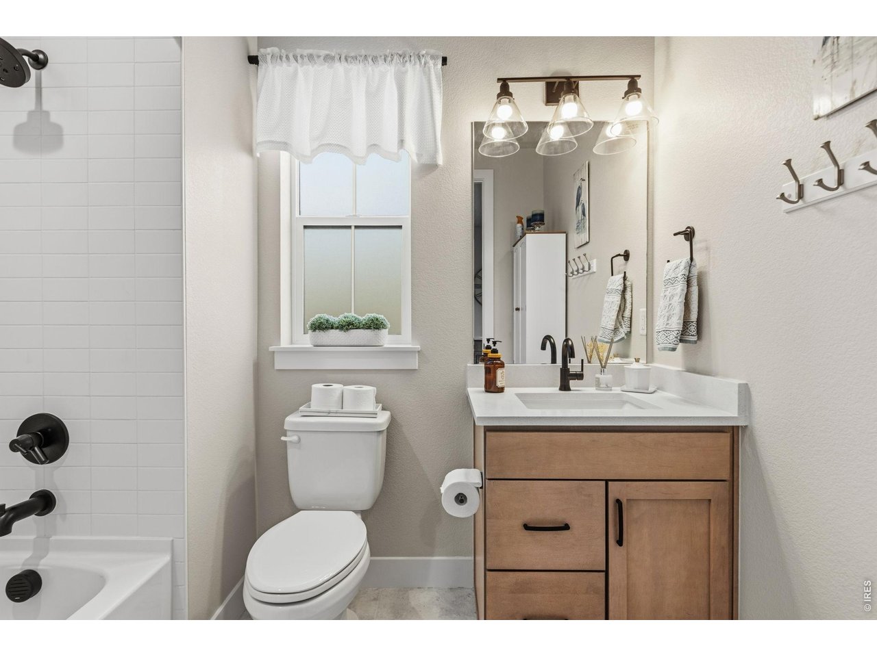 Property Photo 24 Adjacent full bathroom makes the main-floor bedroom ideal for visitors.