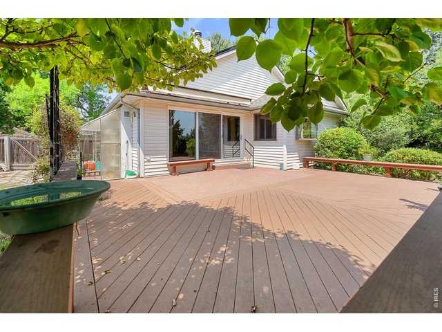 Property Photo 5 Extended deck with retractable awning