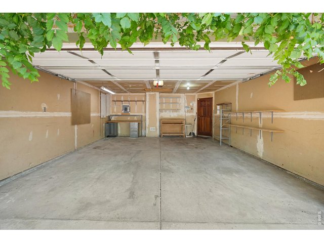 Property Photo 17 oversized two car garage with room for a garage work shop