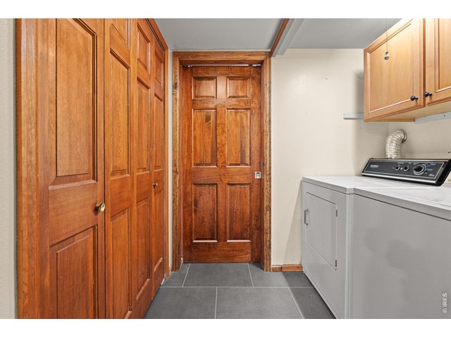 Property Photo 37 Laundry room with plenty of cabinet space