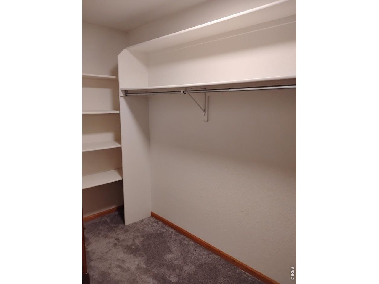 Property Photo 13 Large walk-in primary bedroom closet