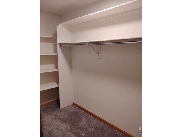 Property Photo 13 Large walk-in primary bedroom closet