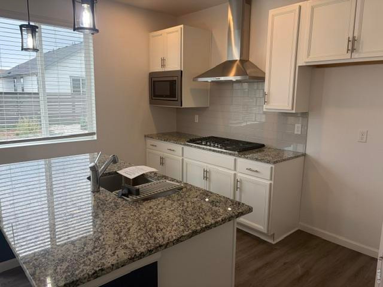 Property Photo 11 Modern kitchen with built in gas range