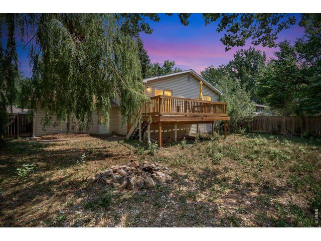 Property Photo 6 Virtual dusk of backyard