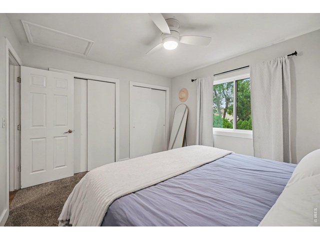 Property Photo 15 Practical bedroom design boasting dual sliding closets to maximize your wardrobe organization.