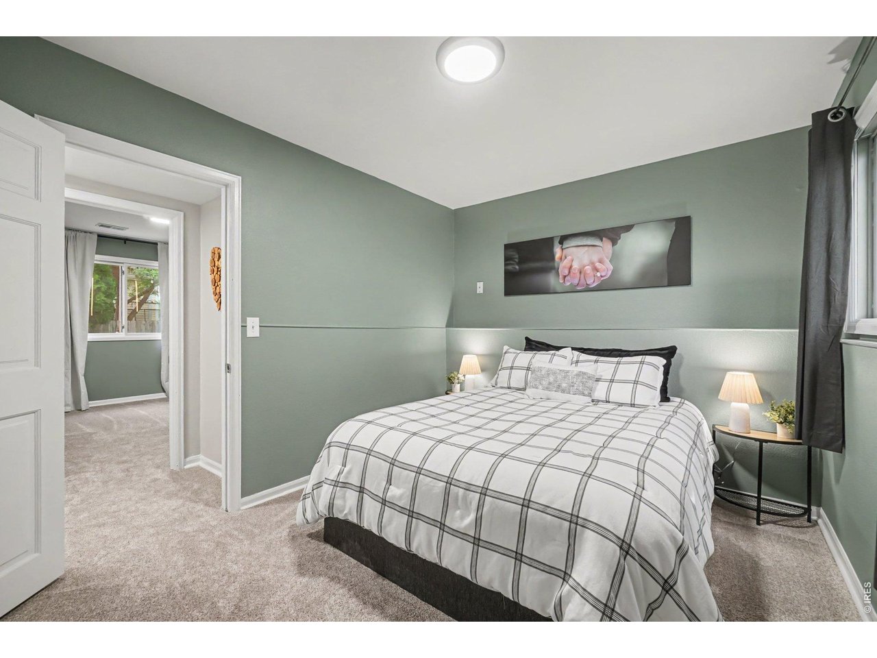 Property Photo 22 Well-proportioned second bedroom with great natural light and seamless flow