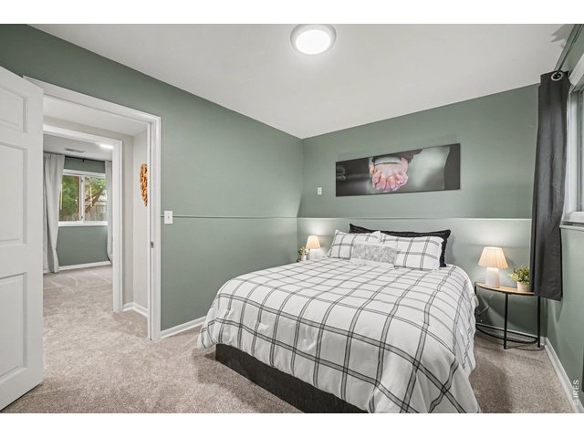 Property Photo 22 Well-proportioned second bedroom with great natural light and seamless flow