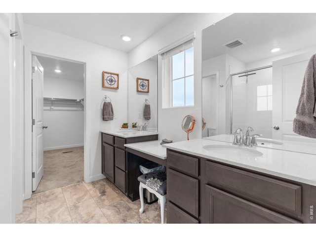 Property Photo 24 Primary Bathroom with Dual Vanities