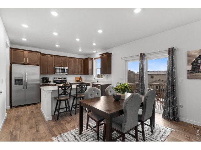 Property Photo 13 Dining Room and Kitchen