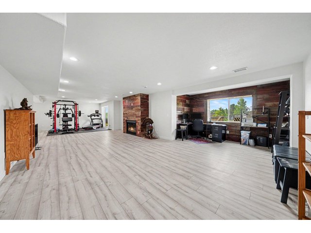 Property Photo 20 Large Recreational room with reclaimed wood accents and space for home office