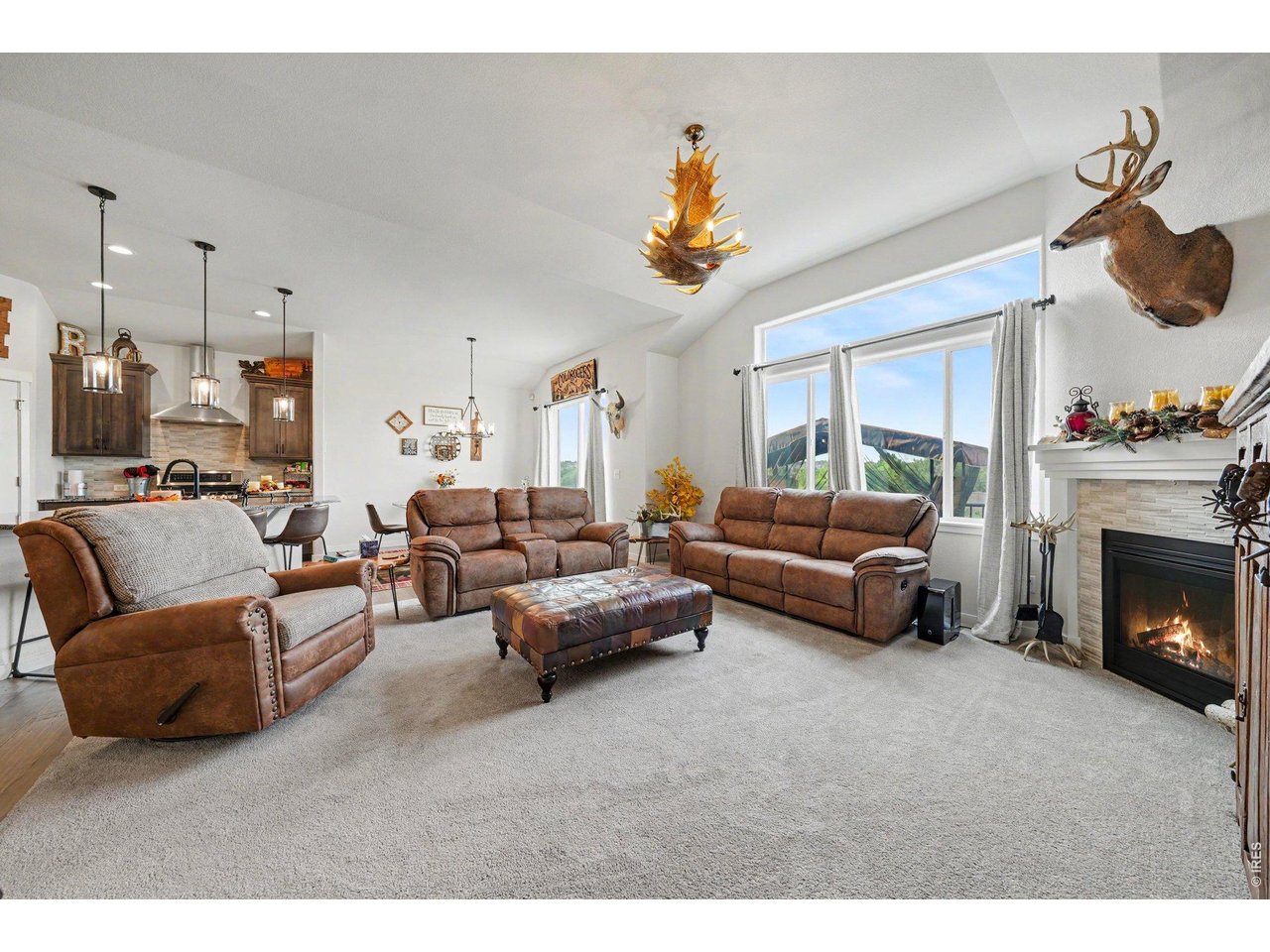 Property Photo 10 Living Room with gas FP and large windows