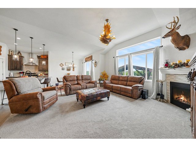 Property Photo 10 Living Room with gas FP and large windows