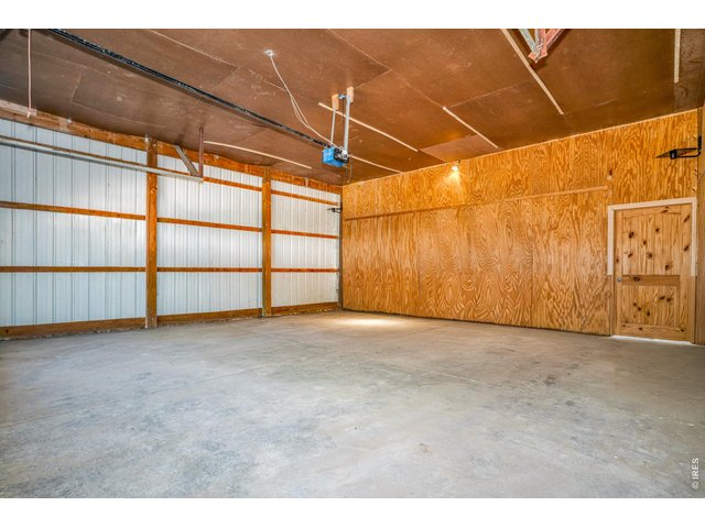 Property Photo 23 2 Car detached garage with attached stables and tack room