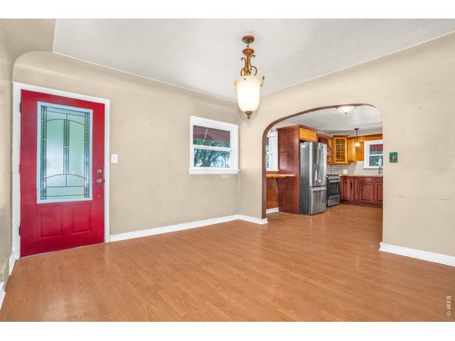 Property Photo 6 Front door / dining room