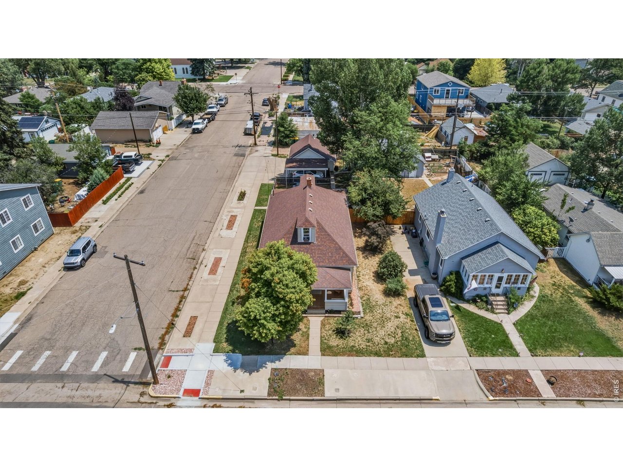 Property Photo 21 Yard and garden opportunities all around the home including the rectangles/square in the sidewalks