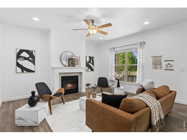 Property Photo 1 Open Foorplan and Gas Fireplace Compliment this Space