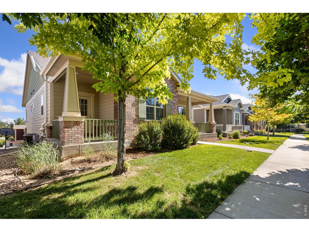 Property Photo 4 Mature Landscaping and a Tree Lined Street