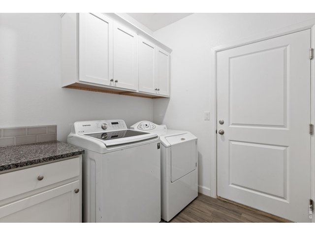 Property Photo 16 Separate Laundry Room with Washer/Dryer Included