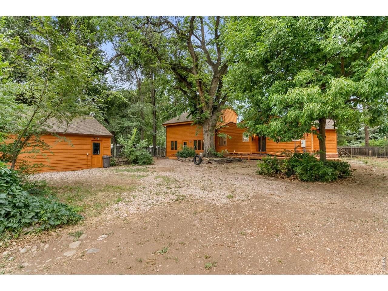 Property Photo 6 Back Yard and Two Car Garage