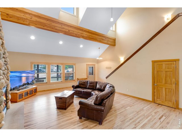 Property Photo 12 Light streams inside through the dormer windows.