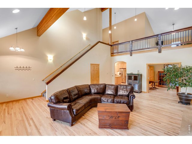 Property Photo 13 Refinished hickory hardwood flooring.