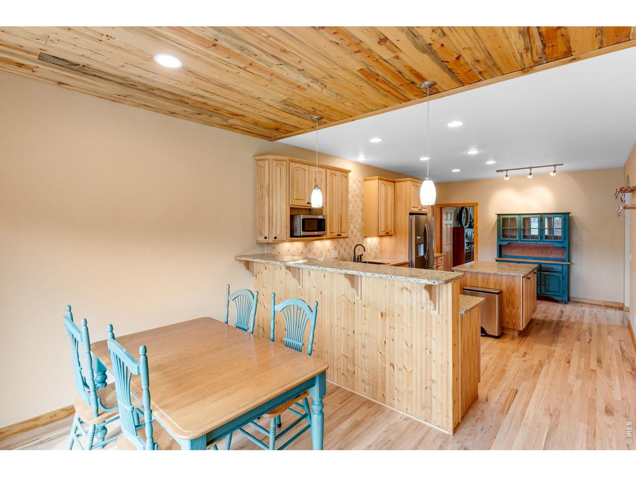 Property Photo 21 Pine ceilings and eat-in kitchen.