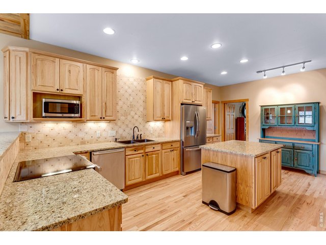 Property Photo 17 Plenty of cabinet space in the chef's kitchen with large island.