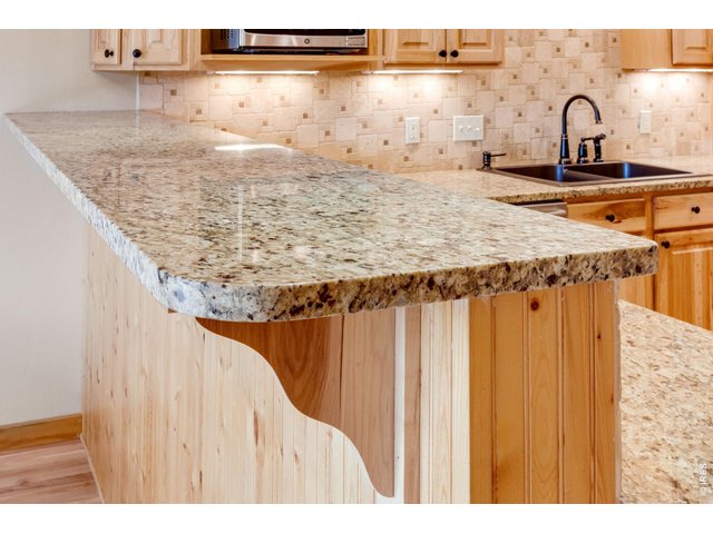 Property Photo 22 Beautiful granite countertops.