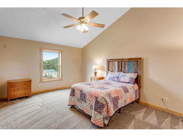 Property Photo 37 Huge upstairs second bedroom with walk in closet.