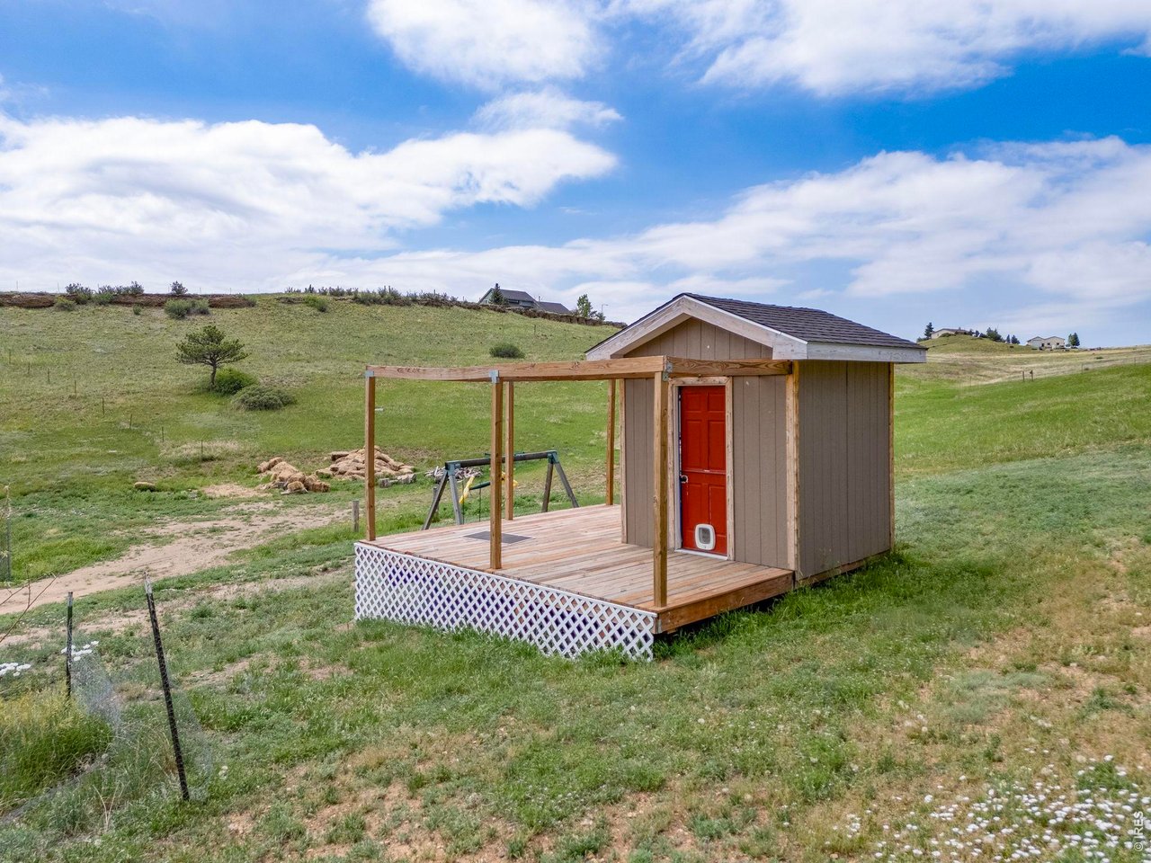 Property Photo 37 Originally built as a playhouse but can be utilized as a Garden Shed.