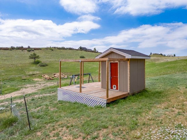 Property Photo 37 Originally built as a playhouse but can be utilized as a Garden Shed.