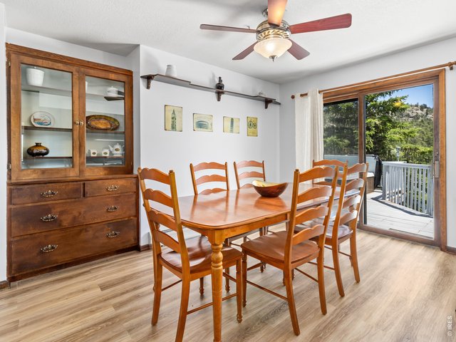 Property Photo 21 Dining and slider to the expansive deck
