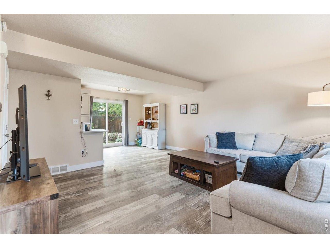 Property Photo 7 Step inside to the spacious living room