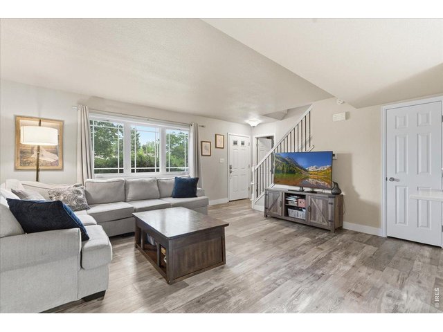 Property Photo 10 Large front windows offer lots of natural light