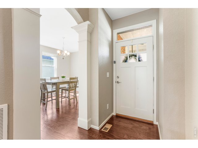Property Photo 4 front door and dining room