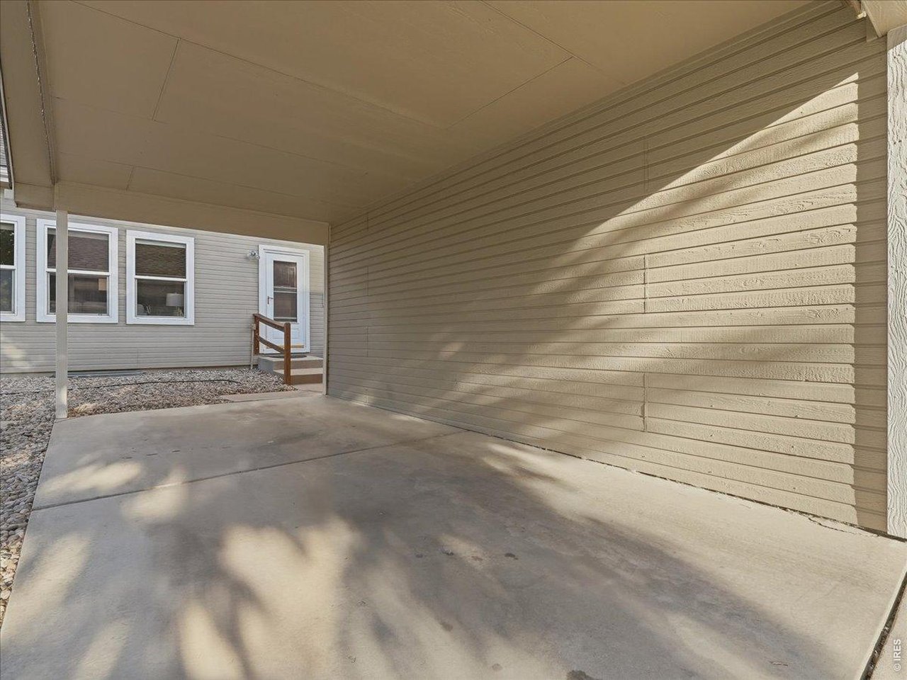 Property Photo 30 carport makes a great, covered patio for a dinner party