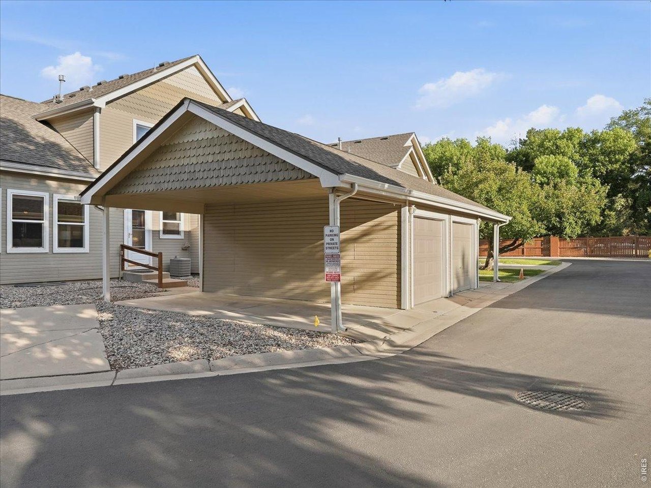 Property Photo 31 2 extra community parking spaces next to carport