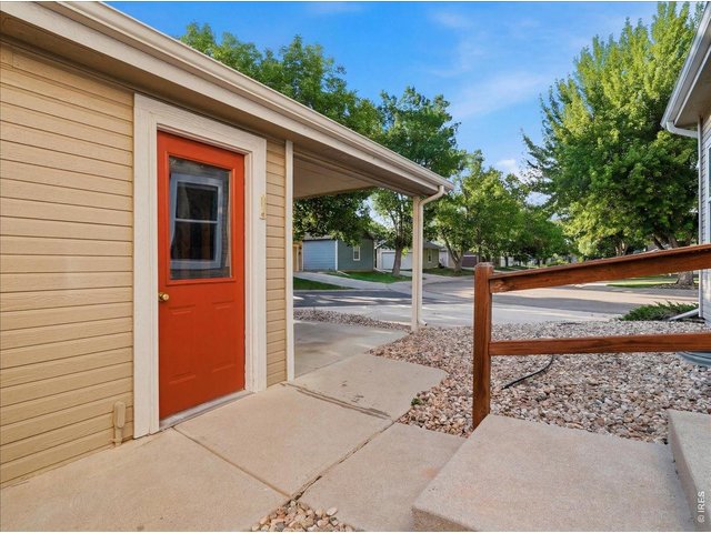Property Photo 28 back entry convenient to the garage and carport