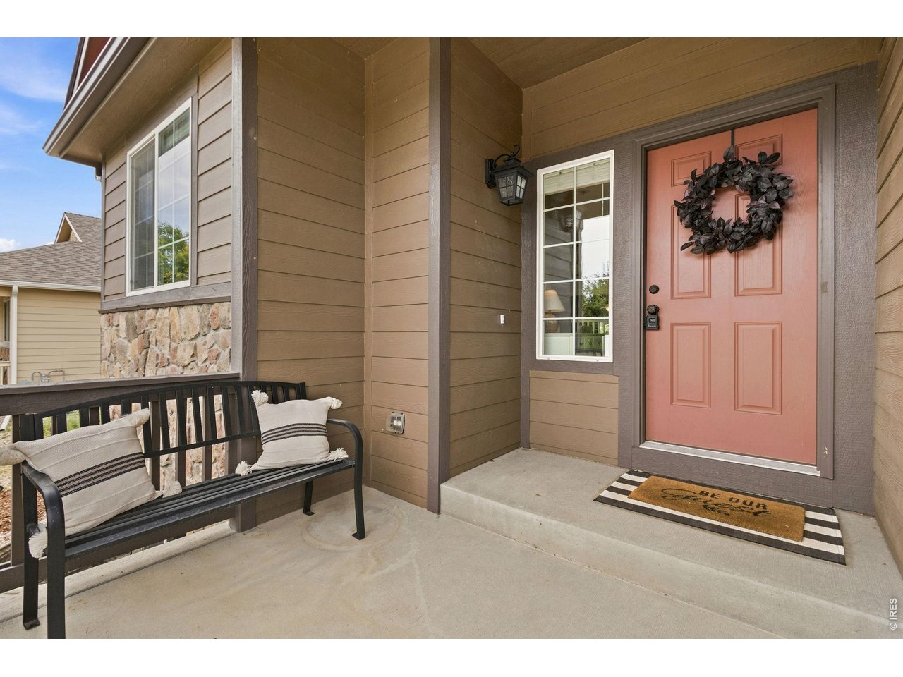Property Photo 2 A welcoming covered front porch. Just in case we ever get rain again!