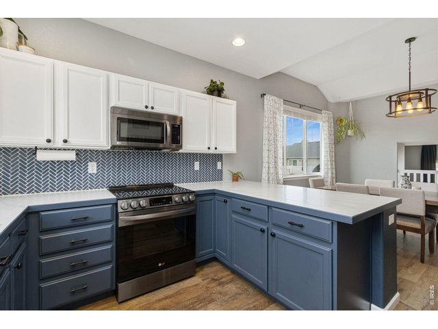 Property Photo 5 Thoughtfully updated kitchen with abundant cabinetry, modern finishes, and plenty of workspace for the home chef.